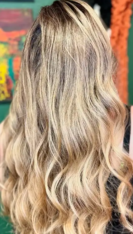 Blonde balayage result with soft dimensional blending
